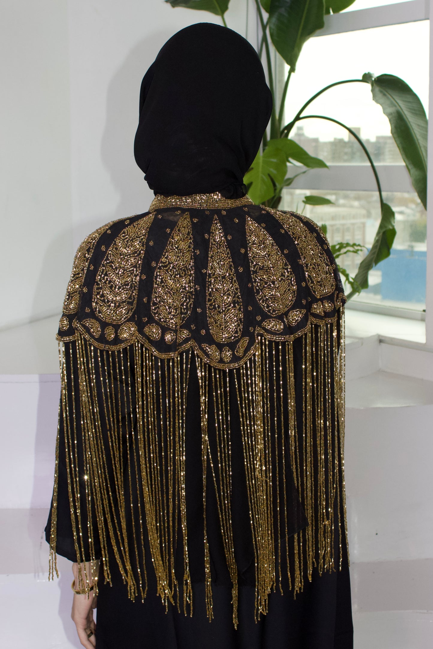 Black and Gold Cape with Fringe Detailing