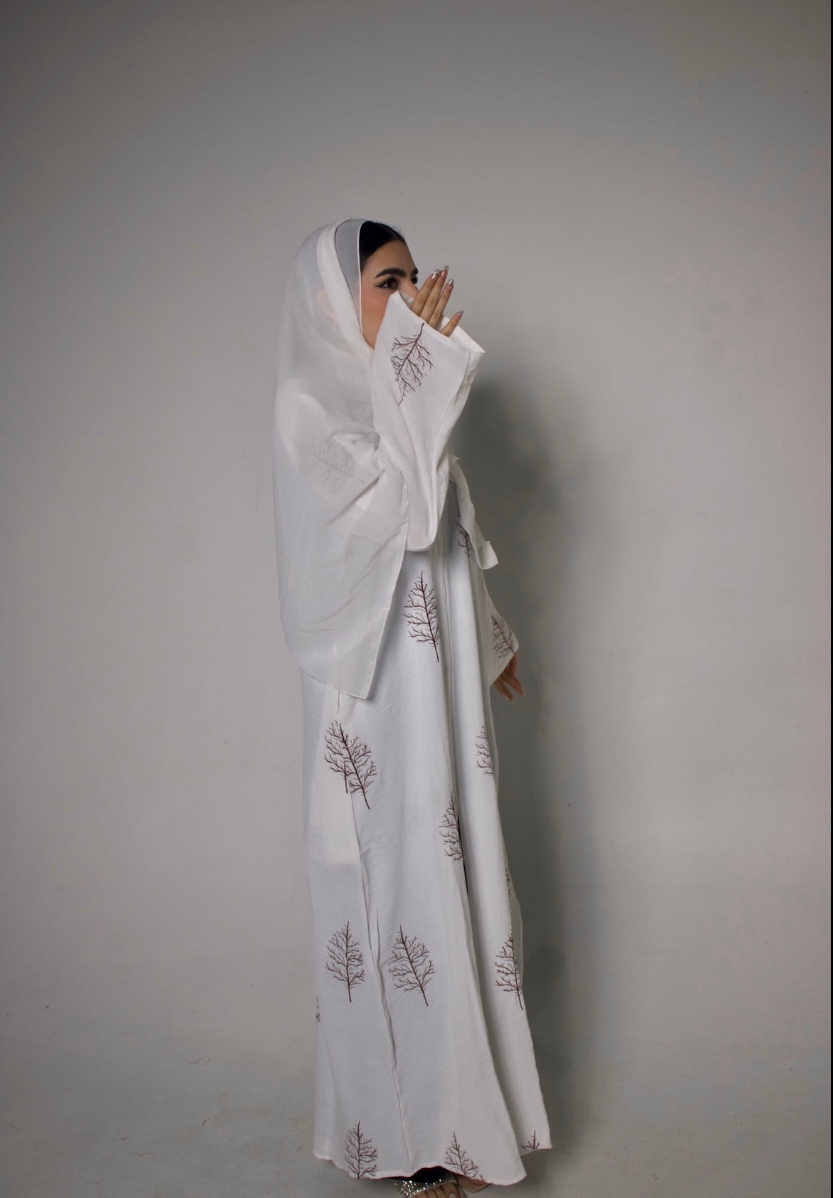 Sara Abaya in White